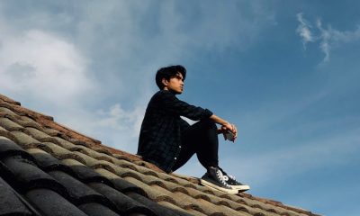 https://unsplash.com/photos/man-in-black-jacket-sitting-on-roof-under-blue-sky-during-daytime-iGm0l9KRkiY